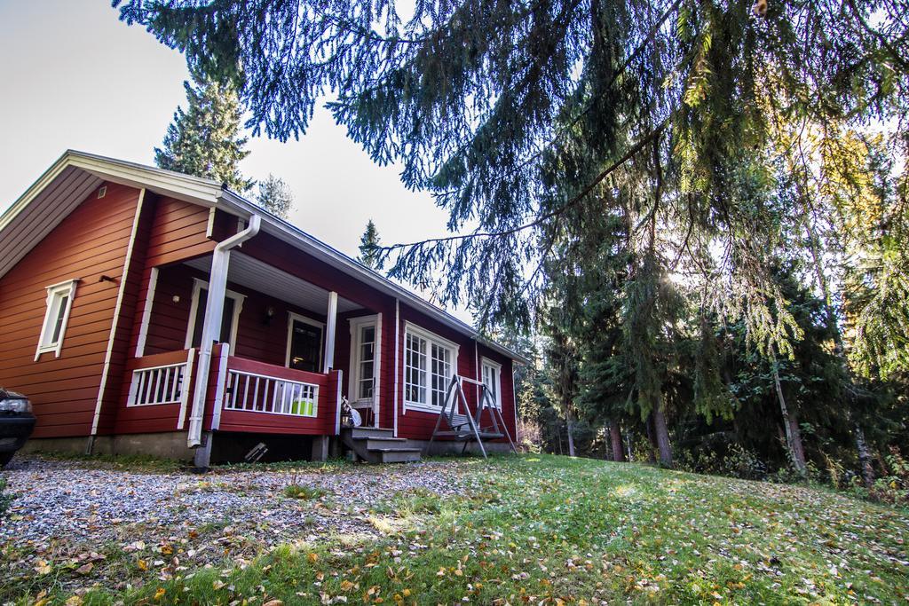 Lomaperkkioe Cottages Каяани Номер фото