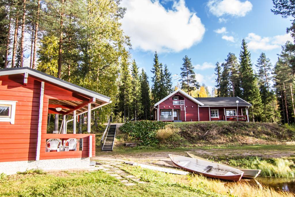 Lomaperkkioe Cottages Каяани Номер фото
