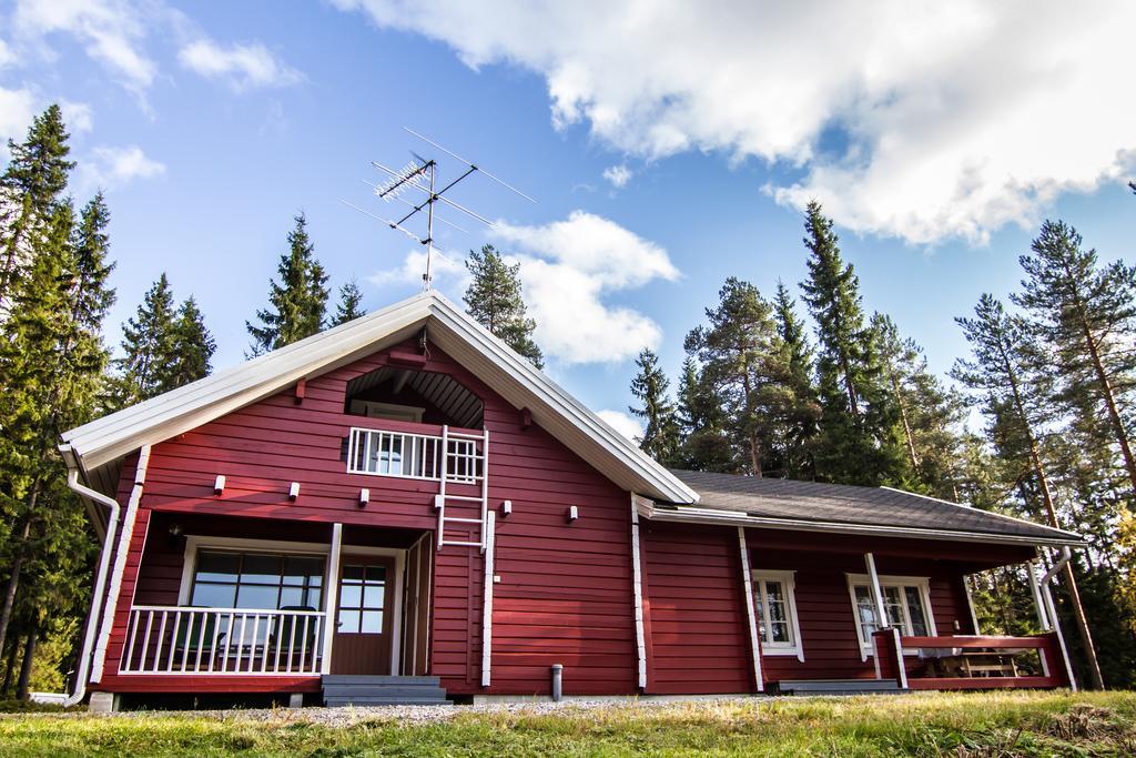 Lomaperkkioe Cottages Каяани Номер фото